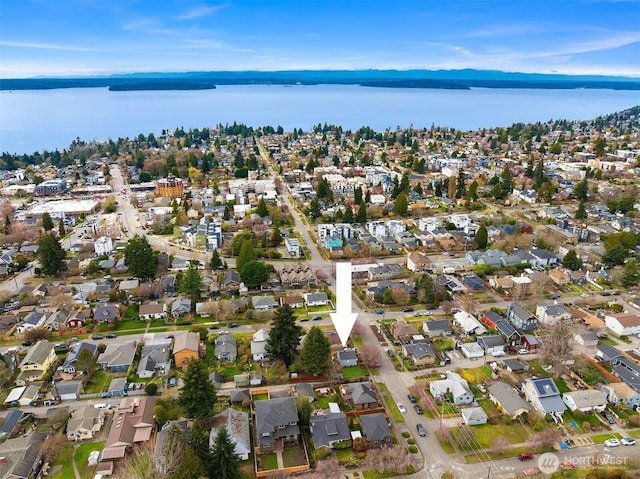 bird's eye view with a residential view and a water view