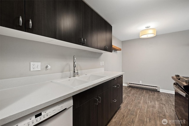 kitchen featuring a sink, electric range oven, light countertops, a baseboard radiator, and dishwasher