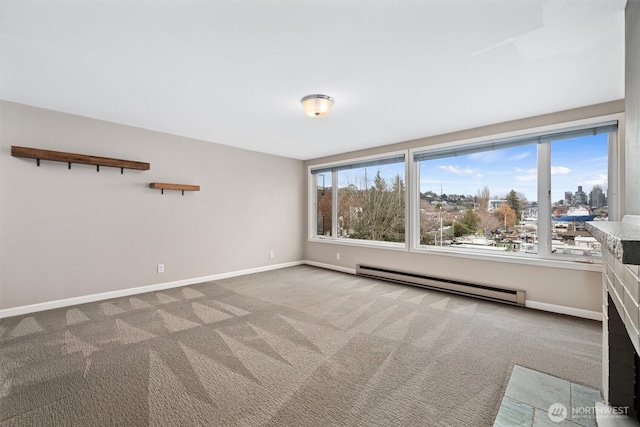 unfurnished room featuring carpet flooring, baseboards, and a baseboard radiator