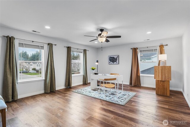 dining room with visible vents, recessed lighting, baseboards, and wood finished floors