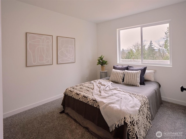 carpeted bedroom with baseboards