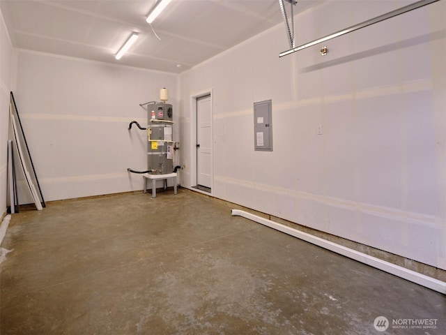 garage with strapped water heater and electric panel