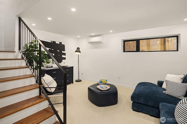 living area featuring stairs, an AC wall unit, recessed lighting, and carpet flooring