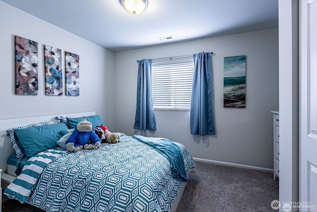 bedroom featuring carpet flooring, baseboards, and visible vents