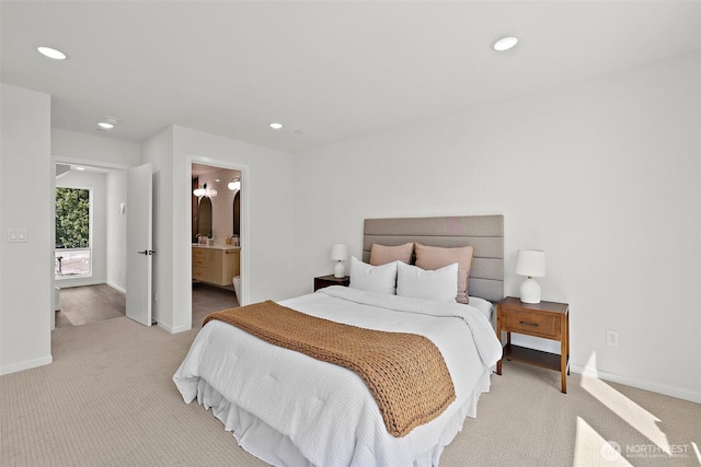 carpeted bedroom featuring recessed lighting, connected bathroom, and baseboards