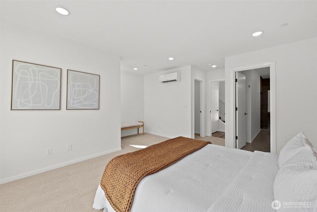 carpeted bedroom featuring recessed lighting, baseboards, and a wall unit AC