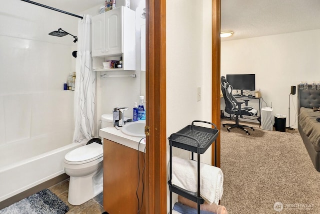 bathroom with vanity, toilet, and shower / tub combo