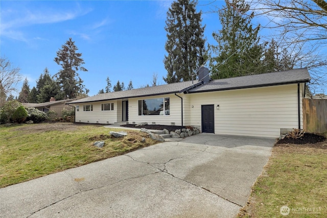 single story home with fence, concrete driveway, a front lawn, and a shingled roof