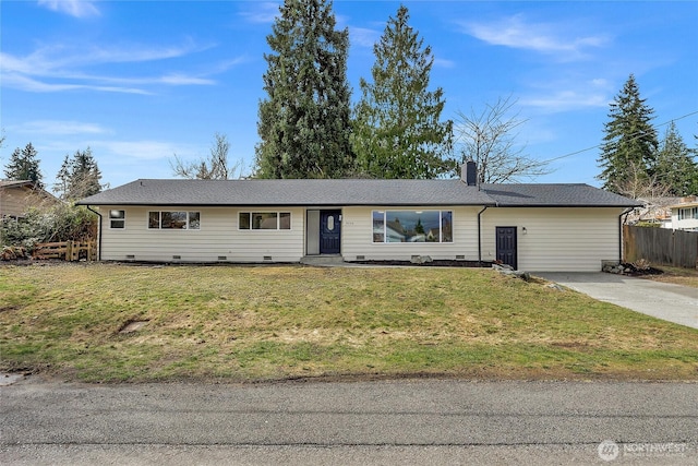 ranch-style house featuring a front yard, fence, a chimney, concrete driveway, and crawl space