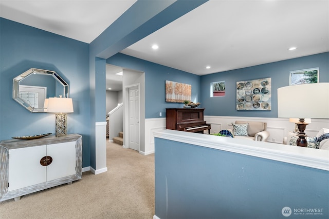 interior space with recessed lighting, stairway, and wainscoting