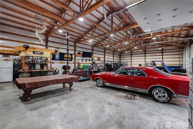 garage with freestanding refrigerator