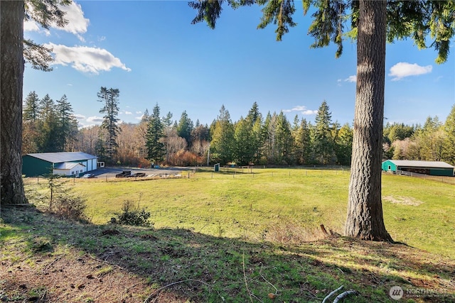 view of yard featuring a view of trees