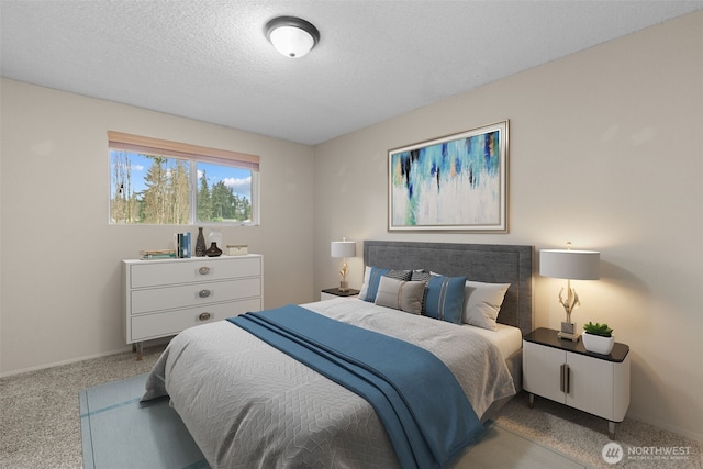 carpeted bedroom with baseboards and a textured ceiling