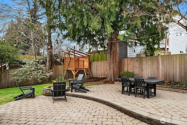 view of patio / terrace with outdoor dining area and a fenced backyard