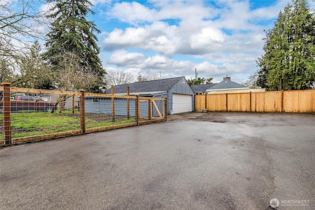 detached garage with fence