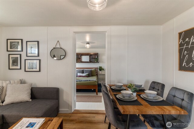 dining room with wood finished floors