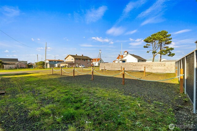 view of yard featuring a residential view