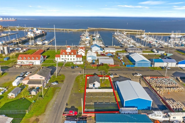 bird's eye view with a water view