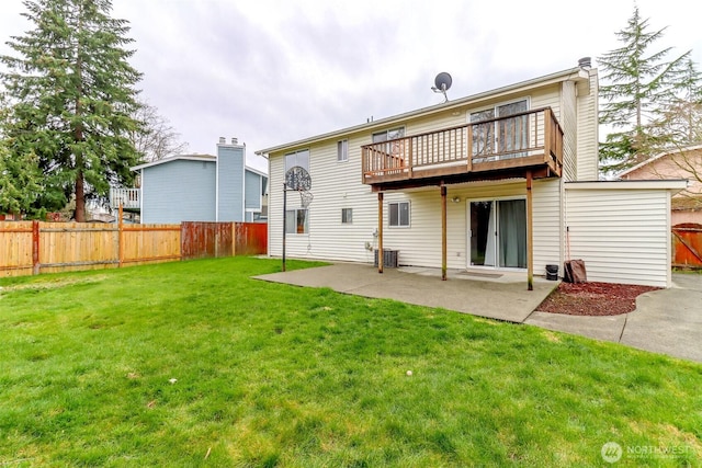 back of house with a patio, a lawn, and fence private yard