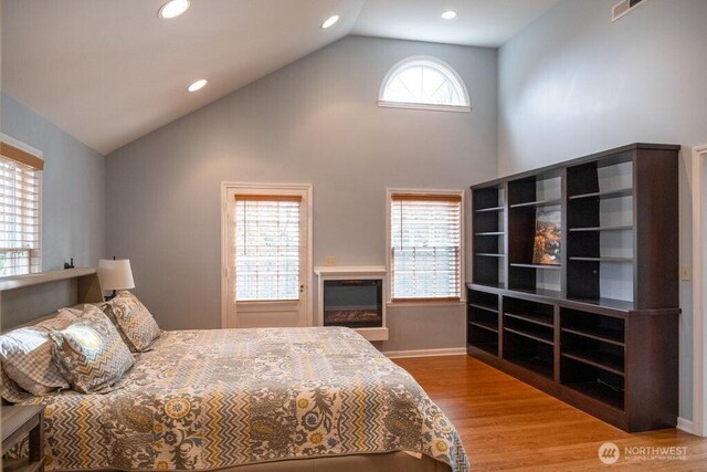 1120 Home Ave, Walla Walla, WA 99362 - bedroom with wood finished floors, recessed lighting, high vaulted ceiling, and baseboards
