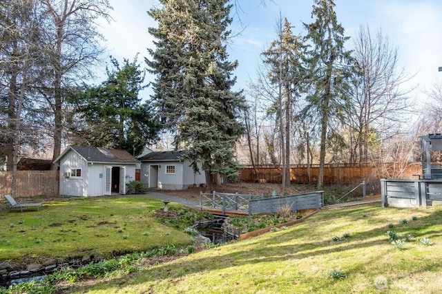 1120 Home Ave, Walla Walla, WA 99362 - view of yard with an outdoor structure and a garden