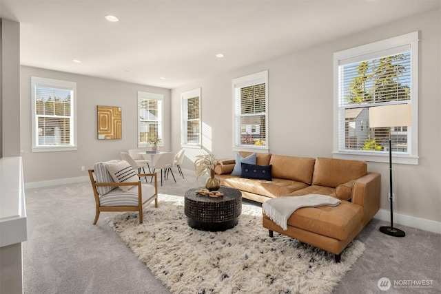 carpeted living room featuring recessed lighting and baseboards