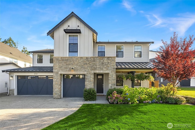 modern farmhouse style home featuring a standing seam roof, concrete driveway, a front lawn, board and batten siding, and metal roof