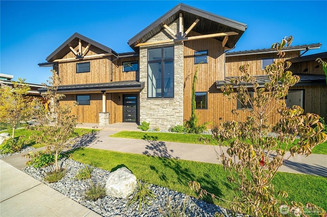 view of front of property with stone siding