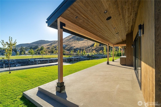 view of patio with a mountain view