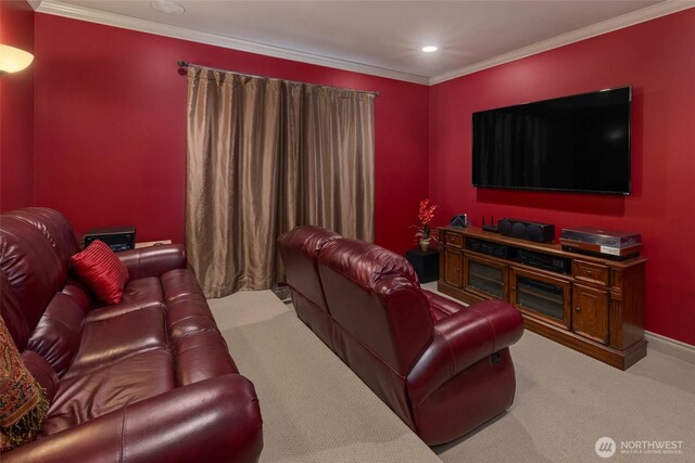 carpeted cinema room featuring recessed lighting, baseboards, and ornamental molding