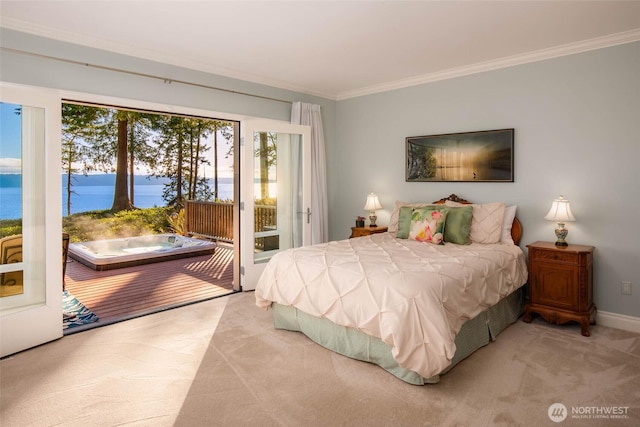 bedroom with light carpet, access to exterior, a water view, and ornamental molding