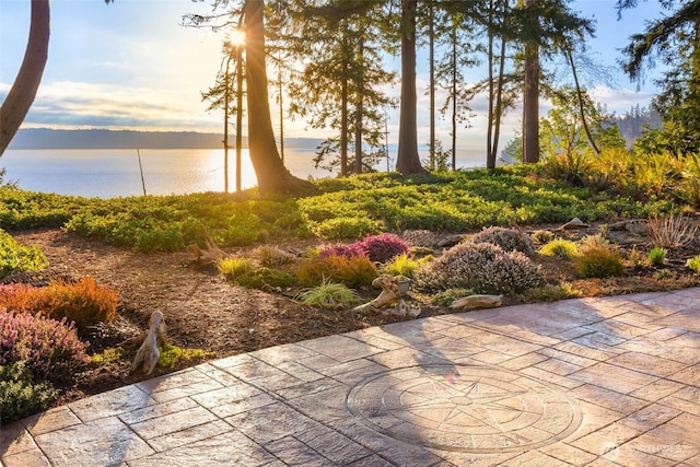 view of patio / terrace featuring a water view