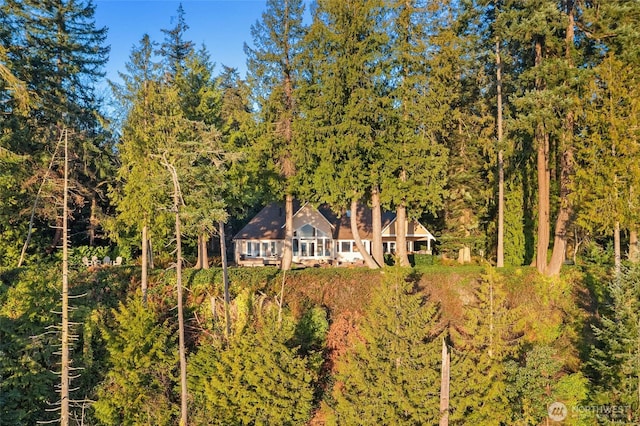 drone / aerial view with a forest view