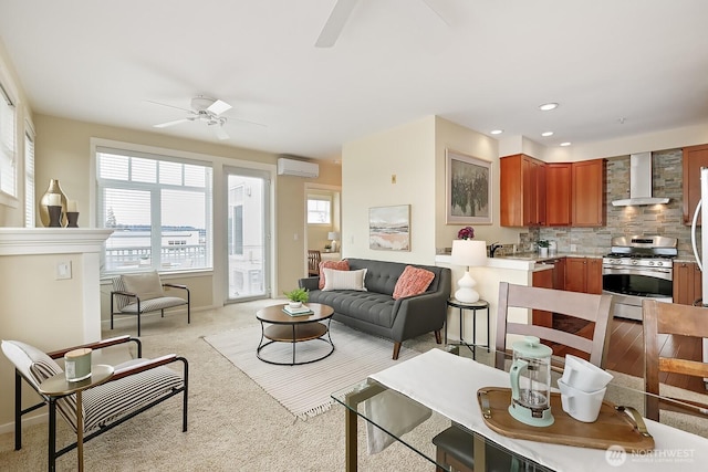 living room featuring recessed lighting, a ceiling fan, a wall mounted air conditioner, and light carpet