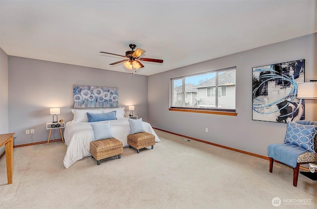 bedroom featuring carpet flooring, baseboards, and ceiling fan