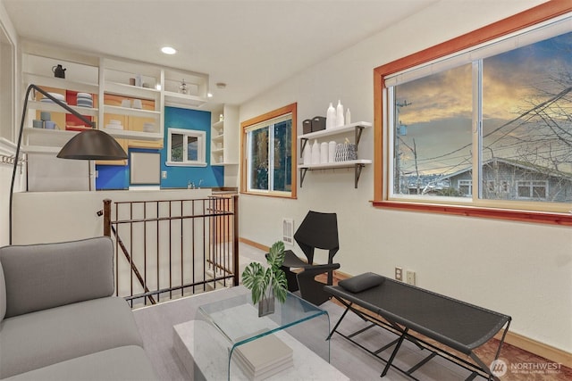 living room featuring recessed lighting and baseboards