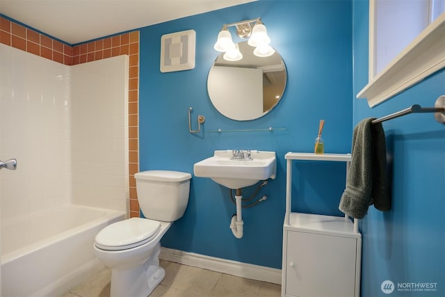 full bath with tile patterned floors, toilet, baseboards, and a sink