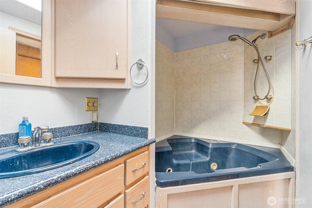 full bath with vanity and a combined bath / shower with jetted tub