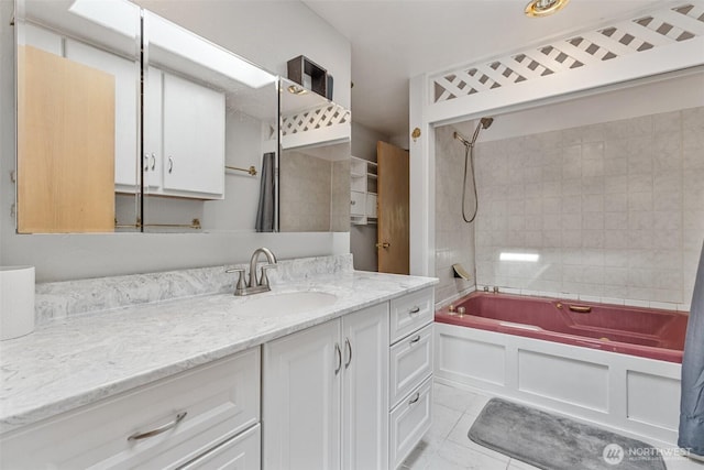 full bath with vanity, tile patterned flooring, and shower / bathtub combination