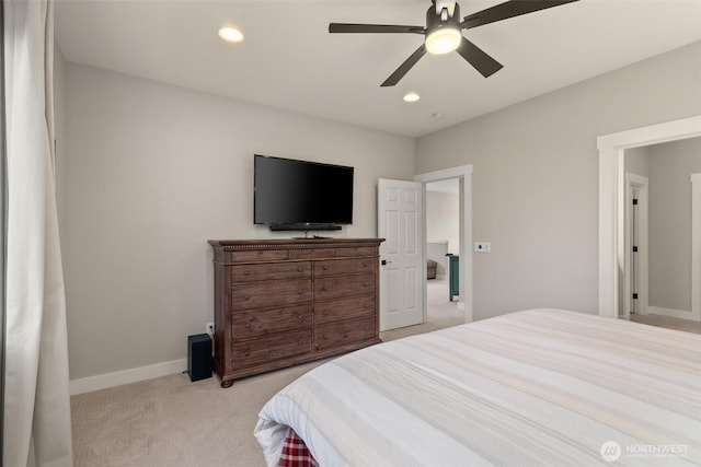 bedroom featuring recessed lighting, baseboards, light colored carpet, and a ceiling fan