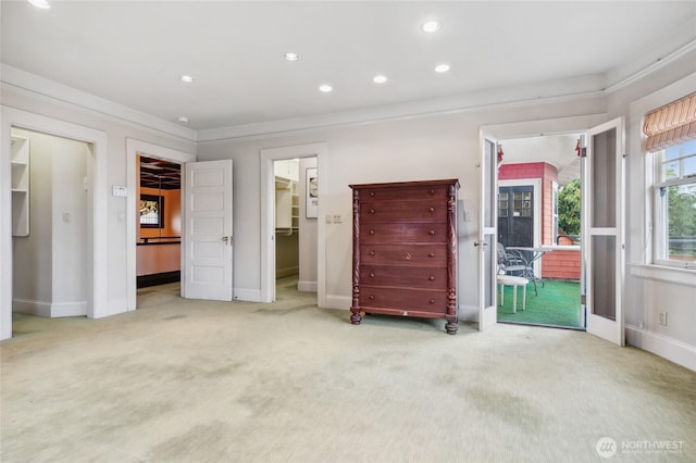 unfurnished bedroom with baseboards, carpet floors, recessed lighting, a spacious closet, and a closet