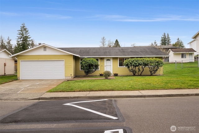 single story home featuring an attached garage, concrete driveway, a front yard, and fence