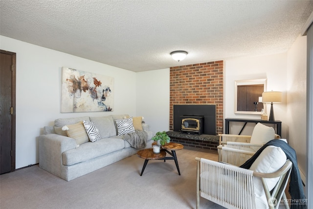 carpeted living room with a brick fireplace and a textured ceiling