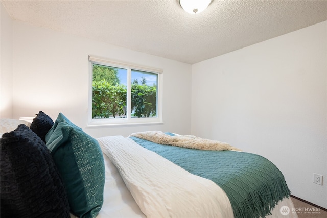 bedroom with a textured ceiling