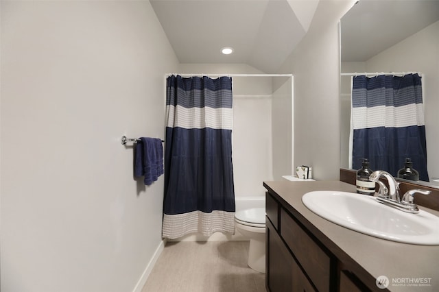 bathroom with vanity, baseboards, lofted ceiling, toilet, and shower / tub combo with curtain