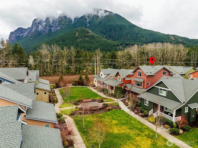 bird's eye view featuring a mountain view and a residential view