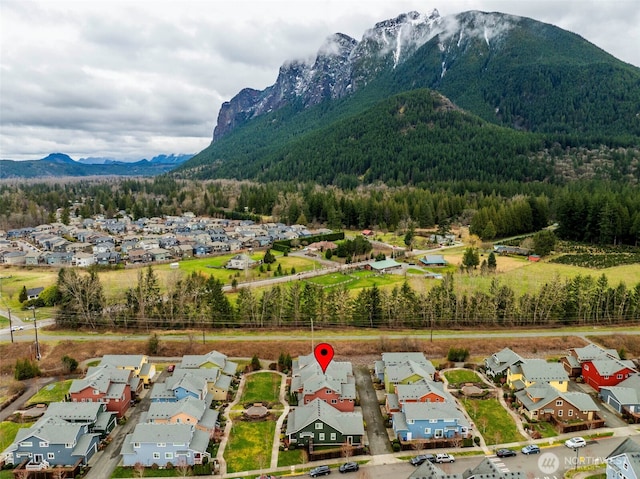 mountain view featuring a residential view and a view of trees