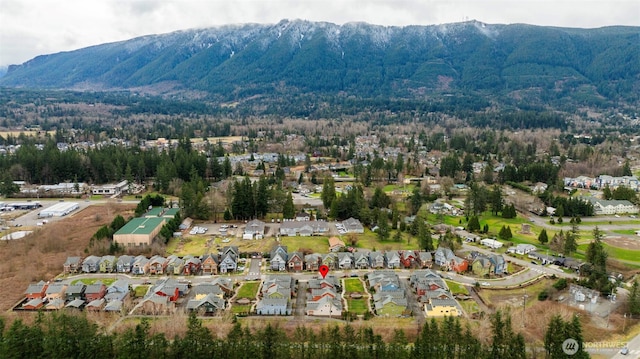 aerial view with a mountain view and a residential view