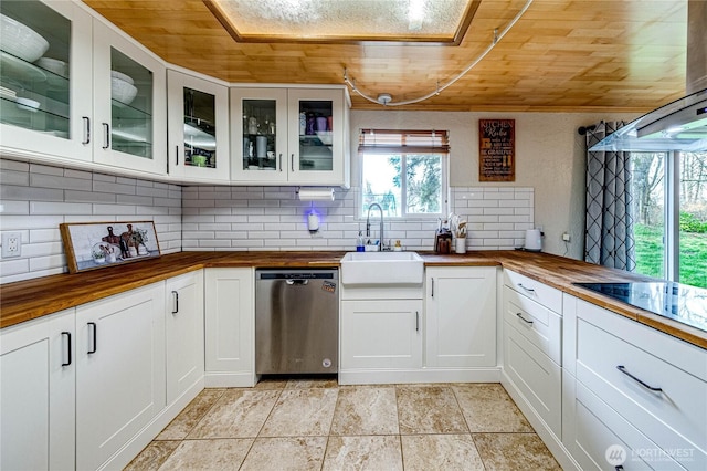 kitchen featuring a sink, wood counters, stainless steel dishwasher, wooden ceiling, and black electric cooktop