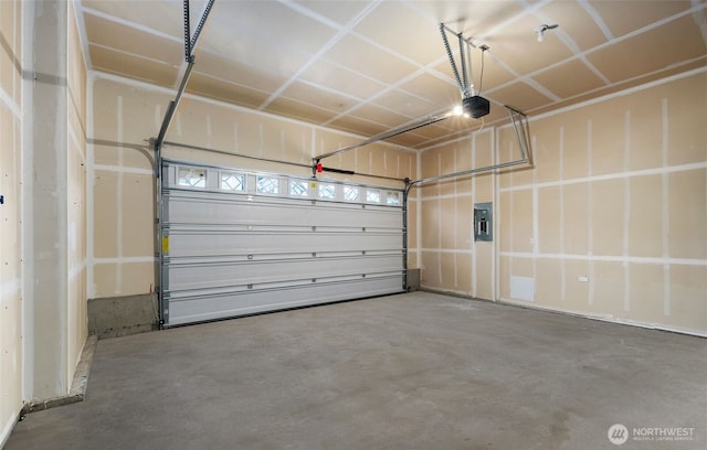 garage featuring electric panel and a garage door opener